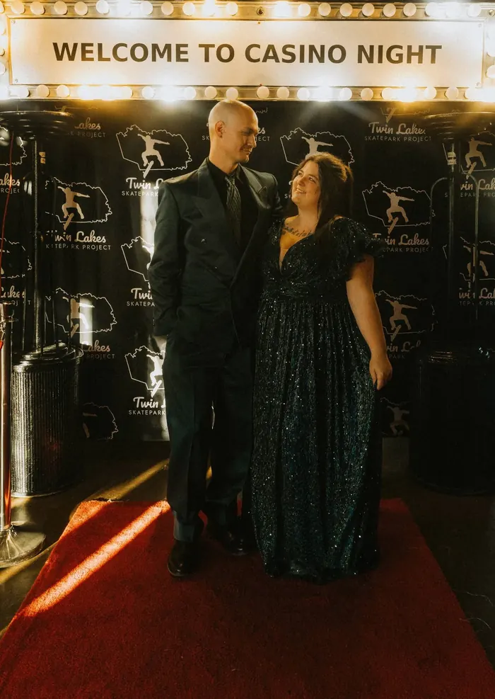 Jordan and Caleb dressed up for a casino night