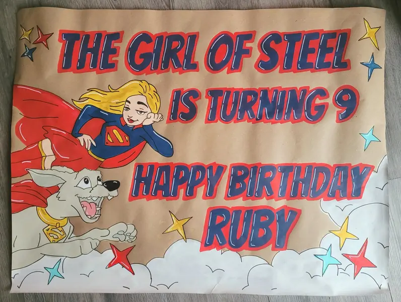 The Girl of Steel Is Turning 9 superhero birthday banner