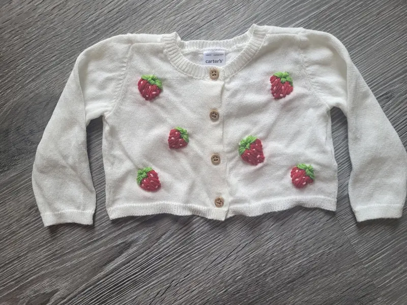 White baby cardigan embroidered with little strawberries