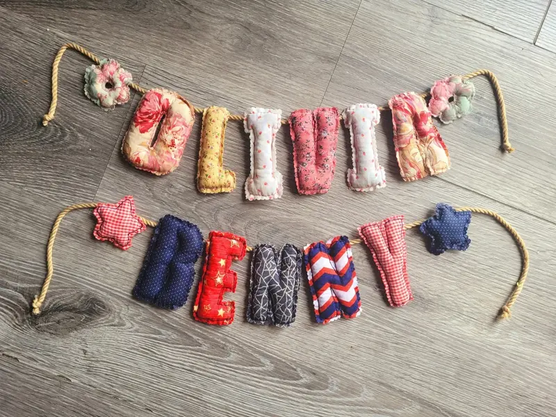 Two-row plush fabric name banner in floral prints
