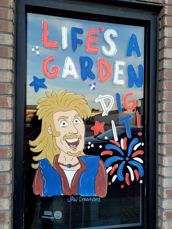 Life's a Garden, Dig It window with a rock-star character and fireworks